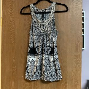 Patterned and Jeweled Racerback Tank with elastic around the waist.